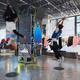 Kids jump in front of a virtual display inside a Nike store